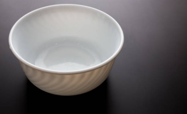 istock White plate for food on a black background 924304228