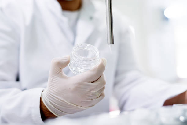 istock The process of packaging cremes into glass packaging. Sterile cosmetics laboratory. 924307648