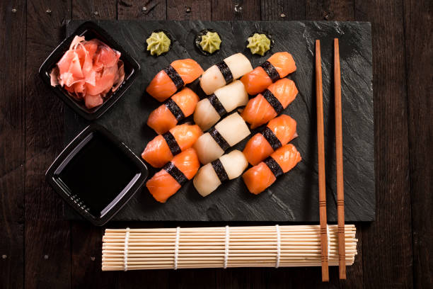 istock Various kinds of sushi served on a platter with soy sauce 924311210
