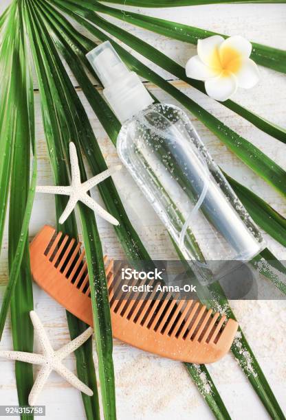 Hairspray With Epsom Salt On Palm Leaf Vertical Stock Photo - Download Image Now - Hairspray - Hair Product, Flat Lay, Merchandise