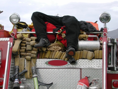 Rescue firefighter man wearing complete firefighting suit