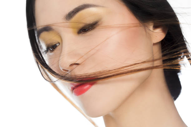 Beautiful young Asian woman portrait with fashionable makeup.