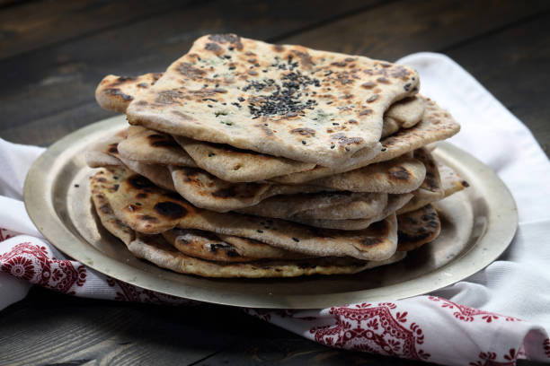 istock Caucasian traditional flat bread with greens and cottage cheese 924325818