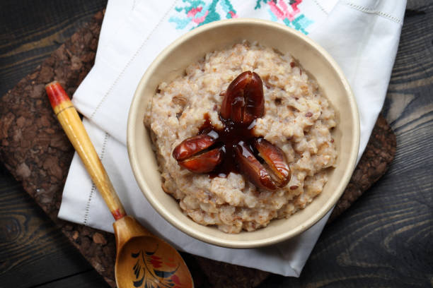 istock Multi-cereal porridge with dates and coffee syrup 924326002