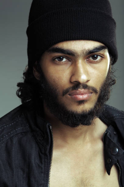 istock Portrait of bearded young man with cap 924326290