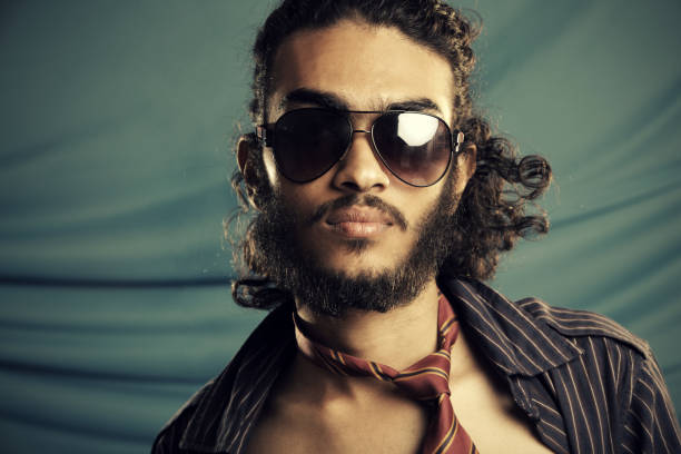istock Attractive shirtless young man with sunglasses 924326372