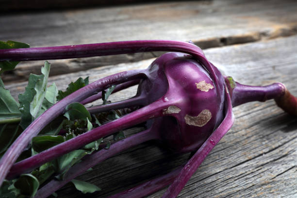 Purple kohlrabi on old boards