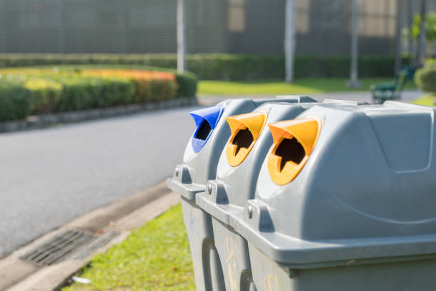 istock Multicoloured Garbage Trash Bins. Recycling bins in public park 924334530