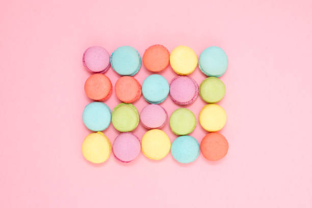 istock A rectangle of colored macaron on a pink background 924337284