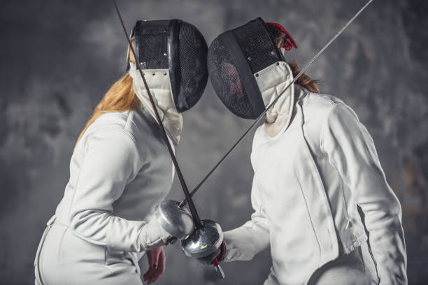 istock Two women fencing 924341102