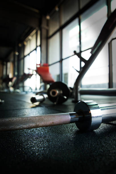 istock Barbell on floor in Gym 924341506