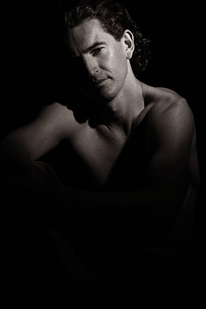 istock Man in seated position - sepia 92434194
