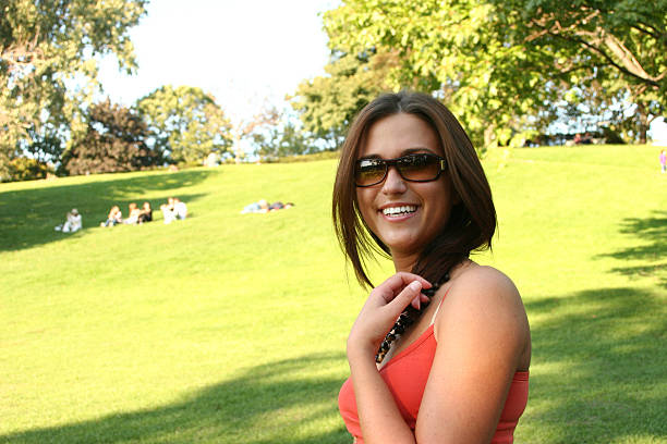 istock Smiling Woman in Park 92435043