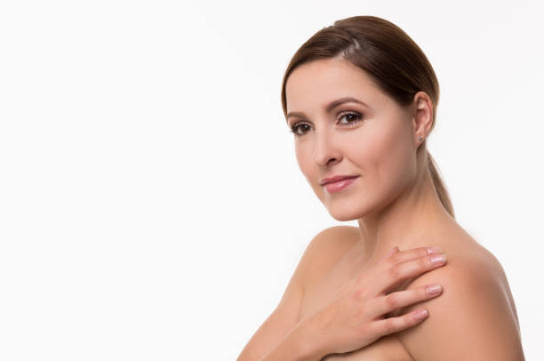 istock Splendid young woman in white studio 924352722
