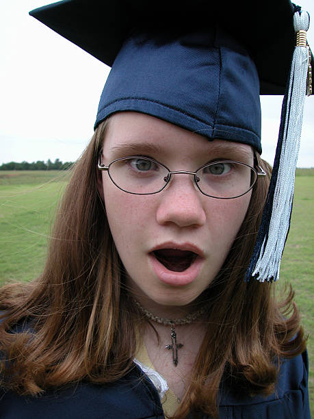 young surprised graduate stock photo