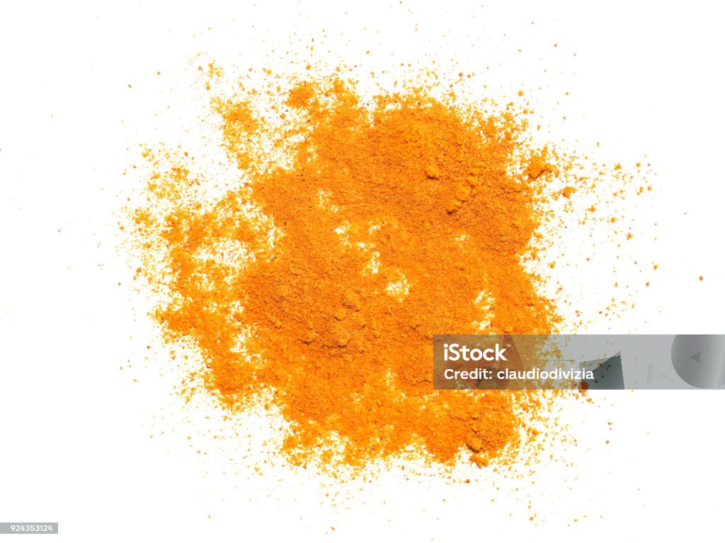 Turmeric (Curcuma) powder over white Turmeric (Curcuma longa) powder hot Indian spice over white background Turmeric Stock Photo