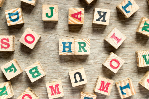 istock Letter block in word HR (Abbreviation of human resource) with another on wood background 924356734