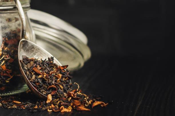 istock tea - mix of deciduous tea with fruit and flowers (black and green) 924360322