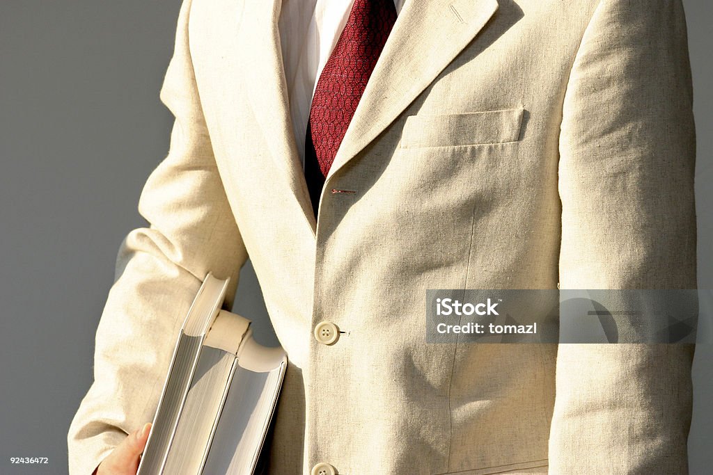 Uomo d'affari con i libri - Foto stock royalty-free di Abbigliamento