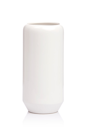 White ceramic flower vase isolated on white.