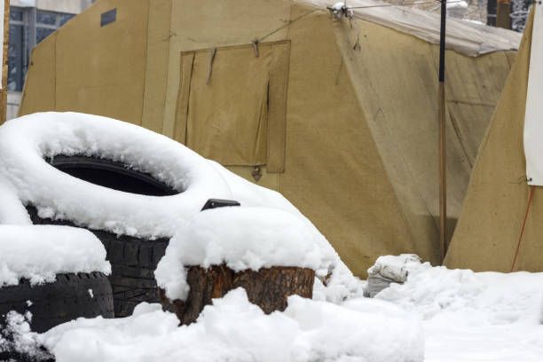 istock Campground protesters with wooden barricades and automotive rubber for setting fire. 924369070