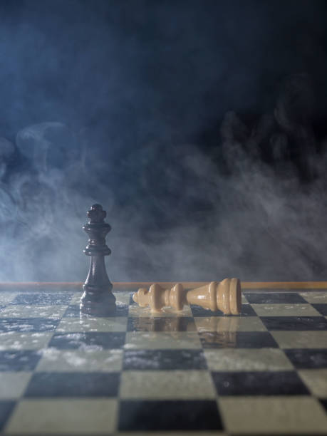 istock Chess figures on a dark background with smoke and fog. Lose and win Concept. Selective focus 924375456