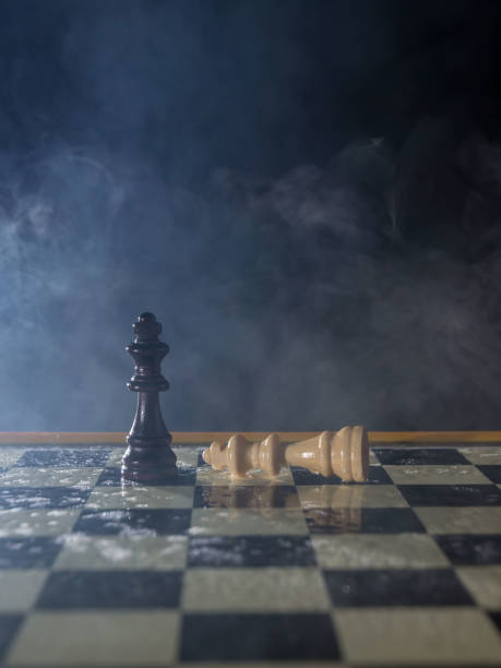 istock Chess figures on a dark background with smoke and fog. Lose and win Concept. Selective focus 924375472