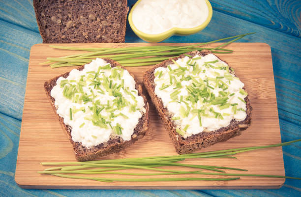 istock Sandwiches with cottage cheese and chives. 924376196