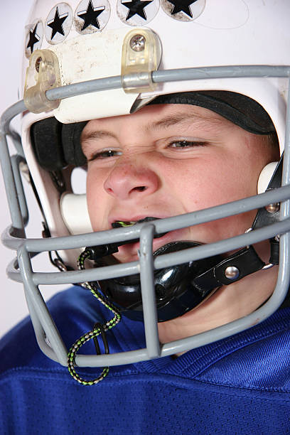 fútbol serie (18 - youth league american football childhood helmet fotografías e imágenes de stock