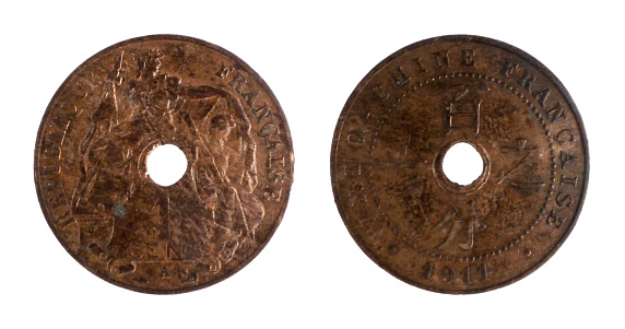 French Indochina bronze coin of one cent minted in 1911 with allegorical female France covering female Asia with flag with value below on the left side and Chinese inscription and date on the right side.