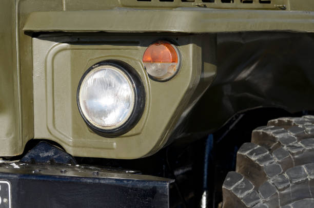 istock A headlight on a military truck. 924382392