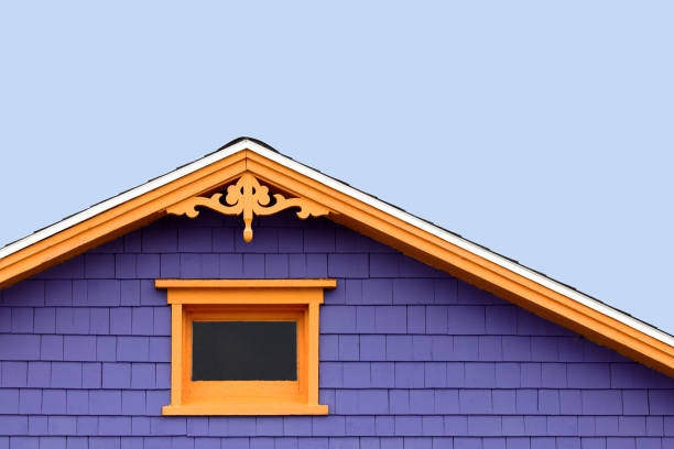 Detail of the gingerbread style fretwork of the typical wooden houses of Iles de la Madeleine, or the Magdalen Islands, in Canada. Minimalistic style in blue, purple and orange with space for text.