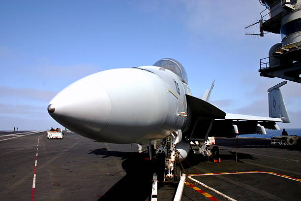 istock Front view of FA-18  SUper Hornet onboard an aircraft carrier 92438411