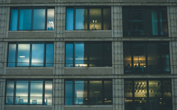 istock People working in the office building in the evening. 924386582