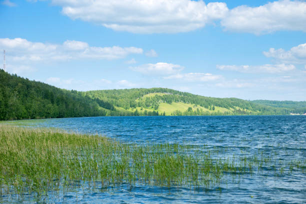 istock nature park with lake and hills 924389756