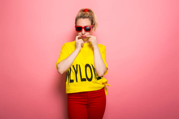 istock Blonde woman in bright clothes 924393296