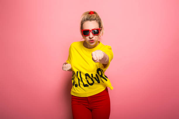 istock Blonde woman in bright clothes 924393316