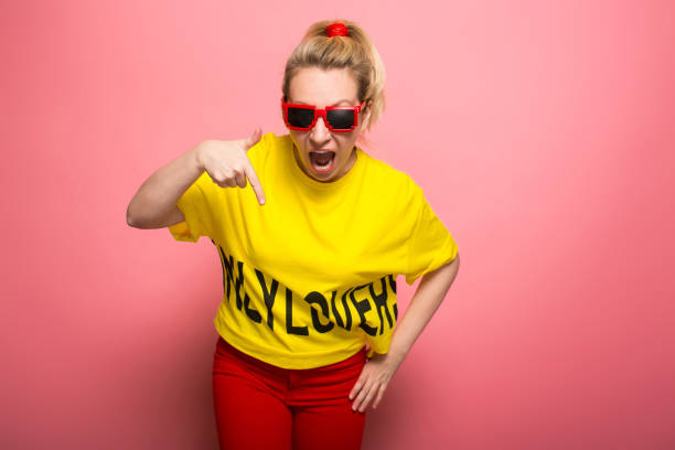 istock Blonde woman in bright clothes 924393324