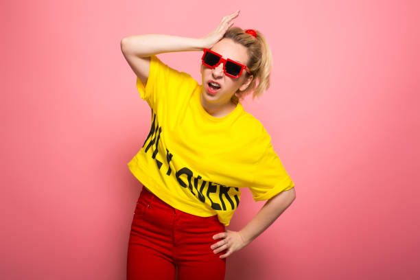 istock Blonde woman in bright clothes 924393326