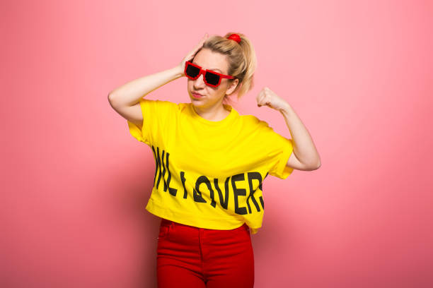 istock Blonde woman in bright clothes 924393334