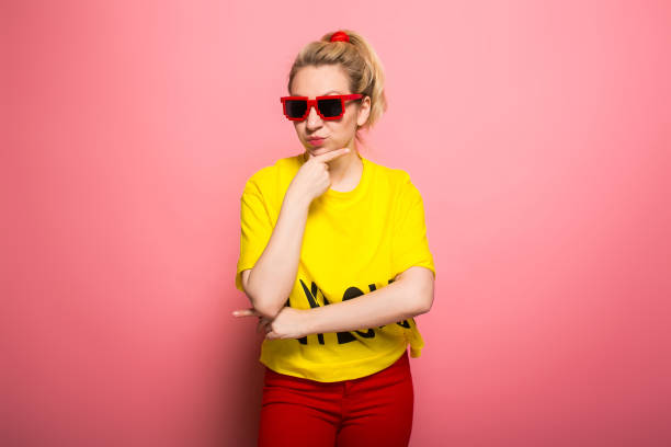 istock Blonde woman in bright clothes 924393340