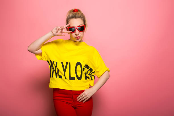istock Blonde woman in bright clothes 924393350
