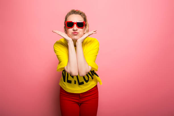istock Blonde woman in bright clothes 924393354