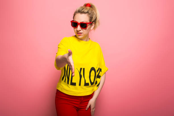 istock Blonde woman in bright clothes 924393356
