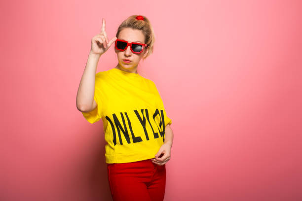 istock Blonde woman in bright clothes 924393360