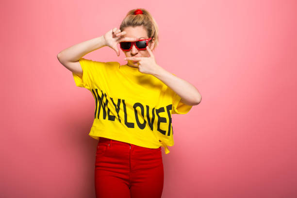 istock Blonde woman in bright clothes 924393362
