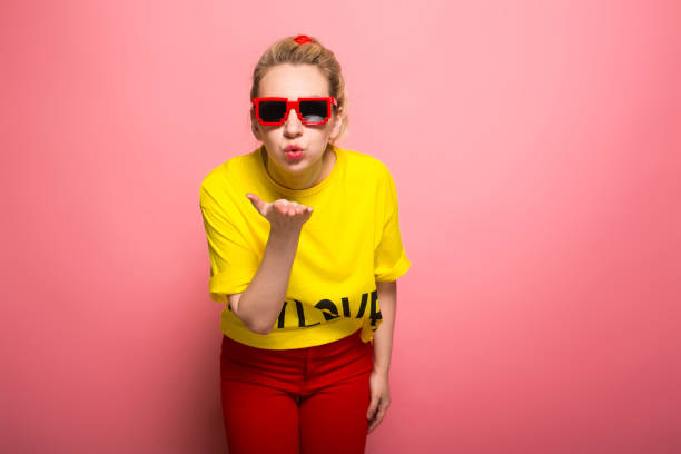 istock Blonde woman in bright clothes 924393370