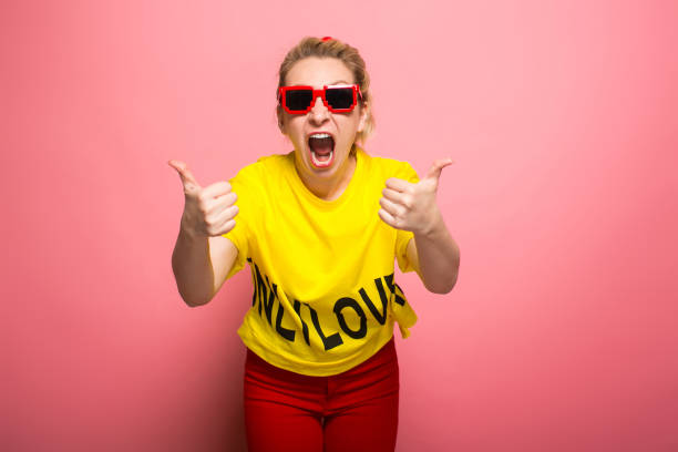 istock Blonde woman in bright clothes 924393380