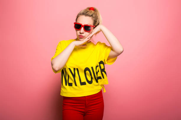 istock Blonde woman in bright clothes 924393382