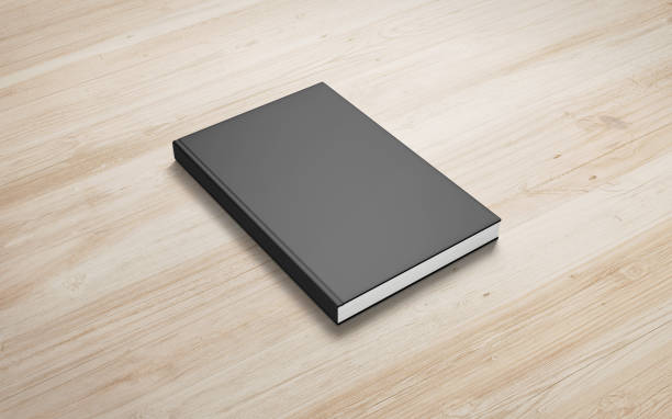istock Book with white hardcover on wooden background. 3d render. 924393490